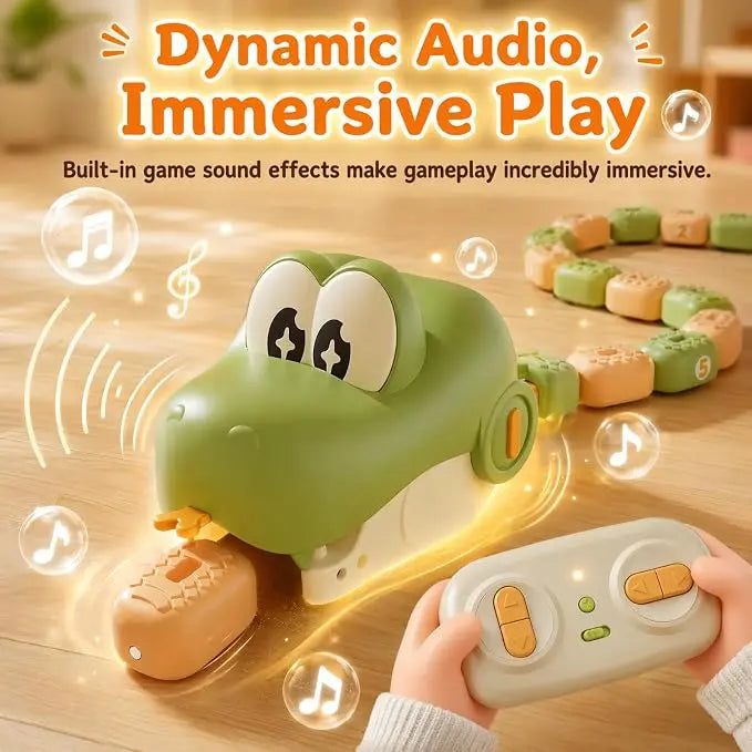 A green toy car with cartoon eyes and a mouth opening, shown on a wooden surface with a child's hands holding a white remote control. The scene includes glowing sound-wave graphics, music note icons, and a coiled toy snake in the background.